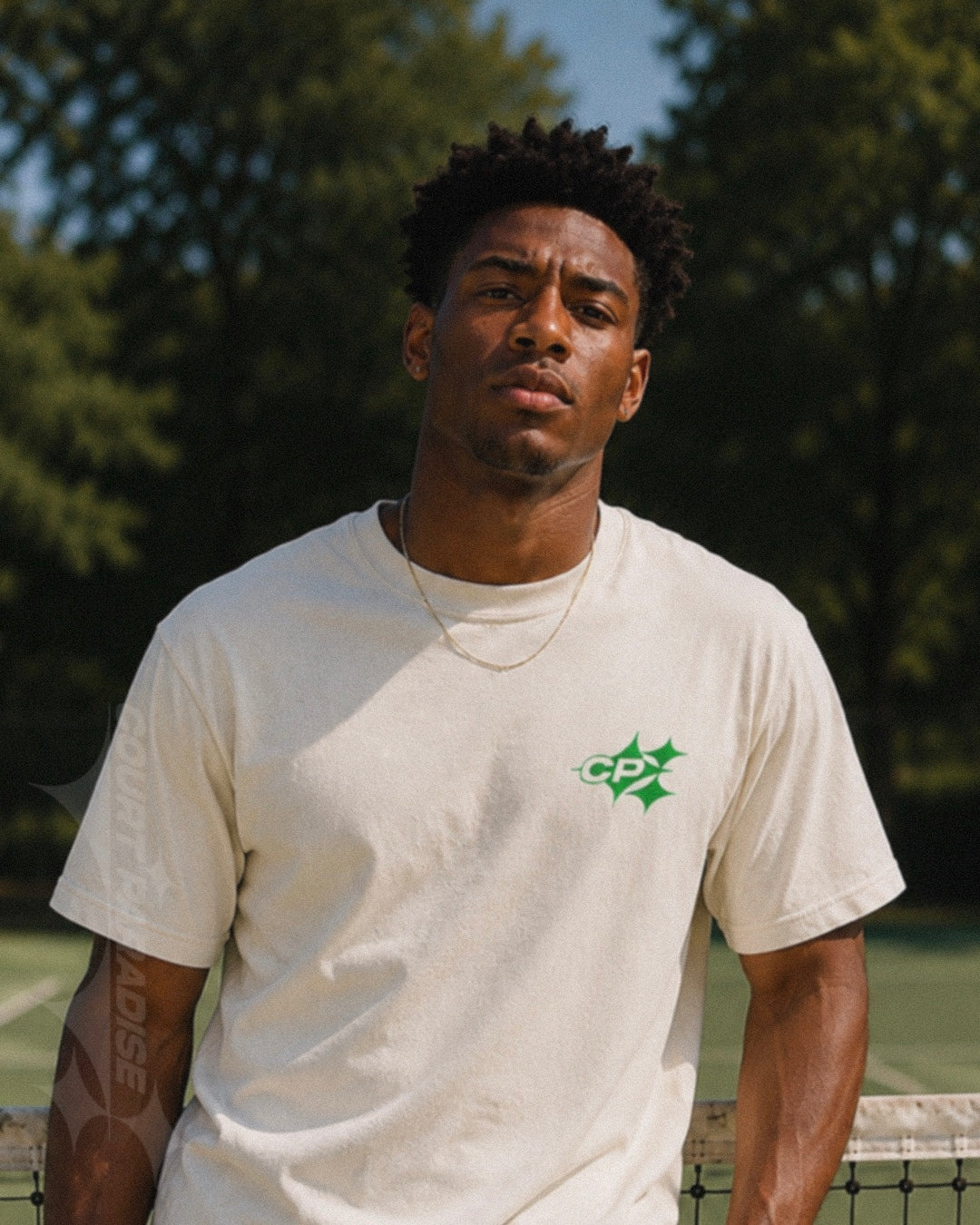 Court Paradise Double Trouble Tee Ecru Green — on-body lifestyle shot, court culture apparel